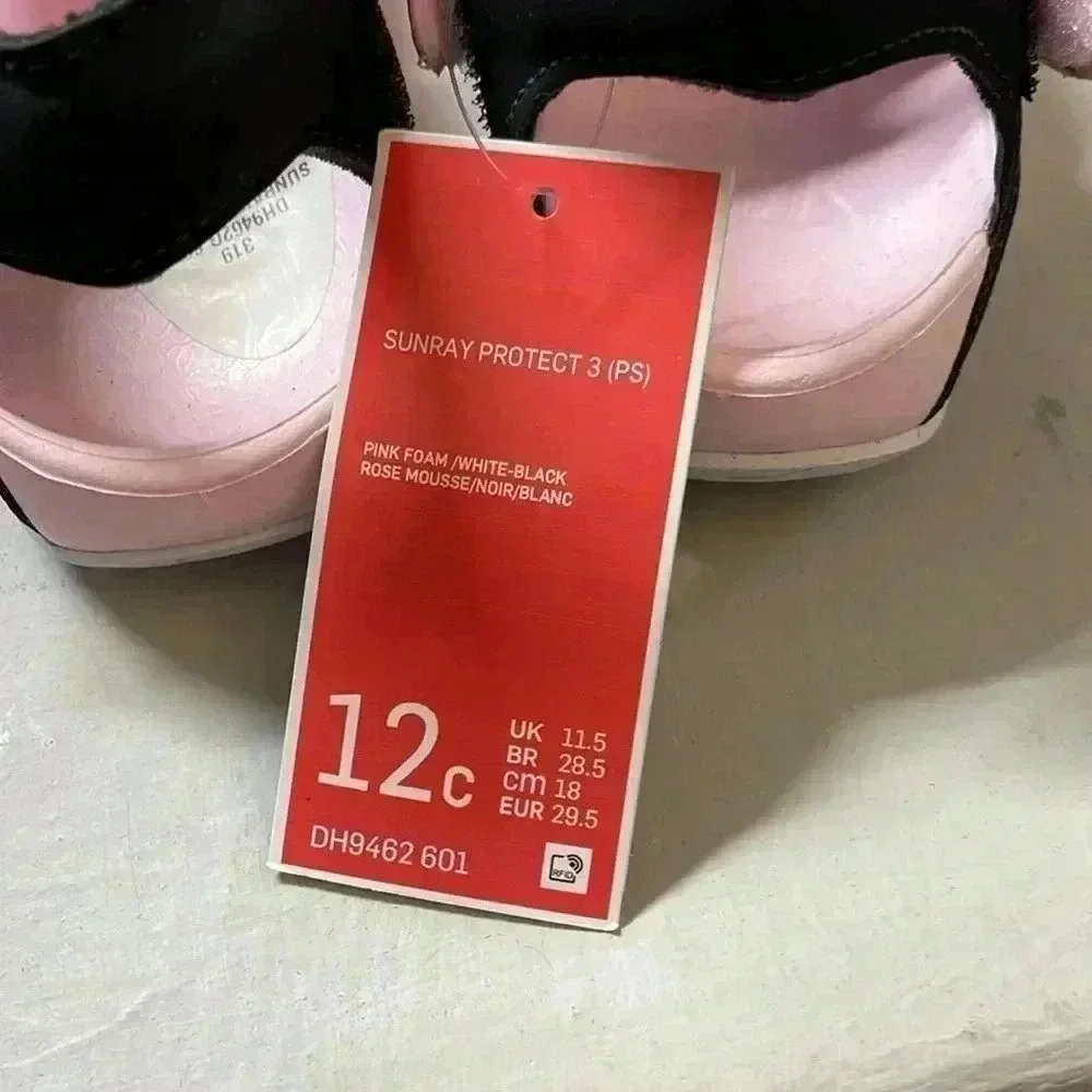 Girls pink Nike shoes
